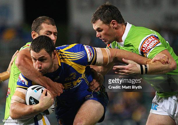 Ben Smith of the Eels is tackled during the round five NRL match between the Parramatta Eels and the Canberra Raiders at Parramatta Stadium on April...