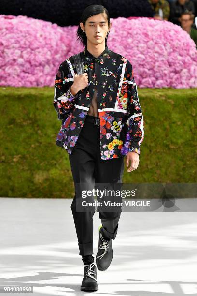 Model walks the runway during the Dior Homme Menswear Spring/Summer 2019 fashion show as part of Paris Fashion Week on June 23, 2018 in Paris, France.