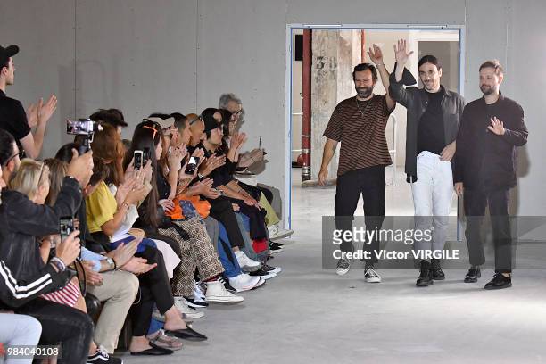Designers Jose Lamali, Jeremie Egry and Aurelien Arbet walk the runway during the Etudes Menswear Spring/Summer 2019 fashion show as part of Paris...
