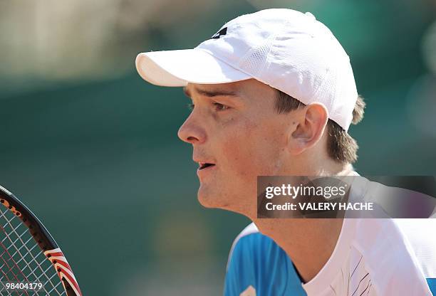 German Andreas Beck hits a return to his Argentinian opponent David Nalbandian during the Monte-Carlo ATP Masters Series Tournament tennis match, on...