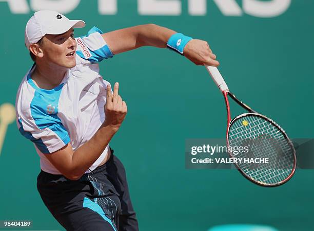 German Andreas Beck serves to his Argentinian opponent David Nalbandian during the Monte-Carlo ATP Masters Series Tournament tennis match, on April...