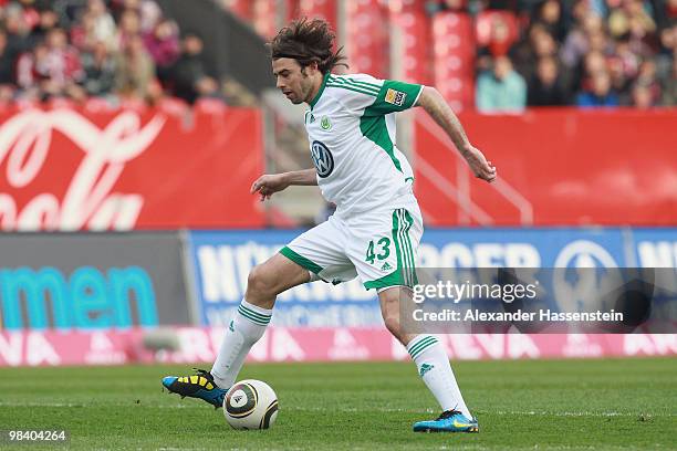 Andrea Barzagli of Wolfsburg runs with the ball during the Bundesliga match between 1. FC Nuernberg and VfL Wolfsburg at Easycredit Stadium on April...