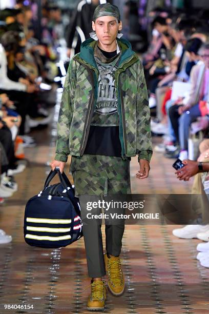 Model walks the runway during the White Mountaineering Menswear Spring/Summer 2019 fashion show as part of Paris Fashion Week on June 23, 2018 in...