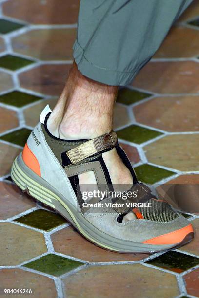 Model walks the runway during the White Mountaineering Menswear Spring/Summer 2019 fashion show as part of Paris Fashion Week on June 23, 2018 in...