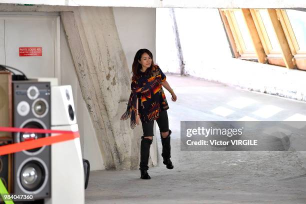 Fashion designer Chitose Abe walks the runway during the Sacai Menswear Spring/Summer 2019 fashion show as part of Paris Fashion Week on June 23,...