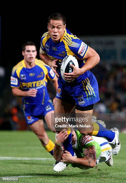 Timana Tahu of the Eels is tackled during the round five NRL match between the Parramatta Eels and the Canberra Raiders at Parramatta Stadium on...