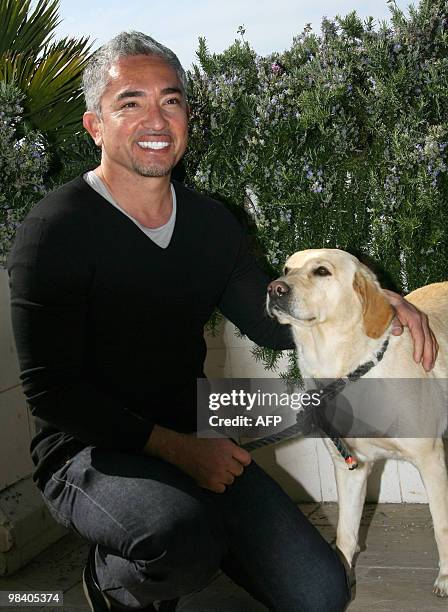 Cesar Milan, TV host of The Dog Whisperer show, poses on April 12, 2010 in Cannes, southern France, during the MIPTV, the world's audio-visual and...