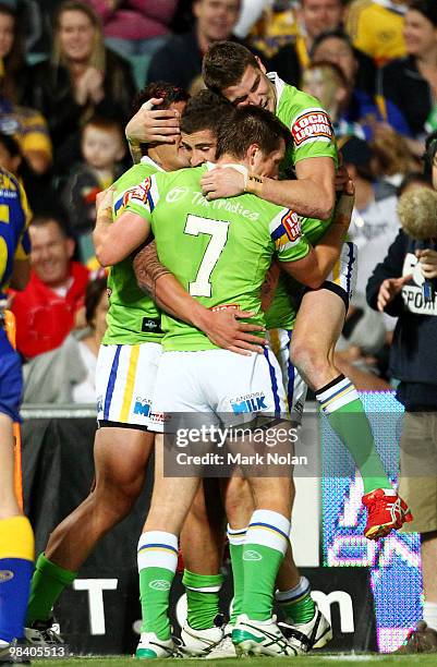 Daniel Vidot of the Raiders celebrates his try with team maets during the round five NRL match between the Parramatta Eels and the Canberra Raiders...