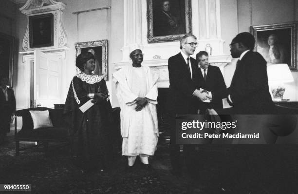 John Major, the new British Prime Minister, meets foreign leaders at Number 10 Downing Street, November 1990. Behind him is Jonathan Powell, later...