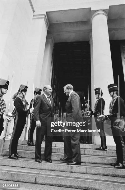 Secretary of Defense Dick Cheney visits the Ministry of Defence headquarters in Whitehall with UK Defence Secretary Tom King, 15th October 1990.