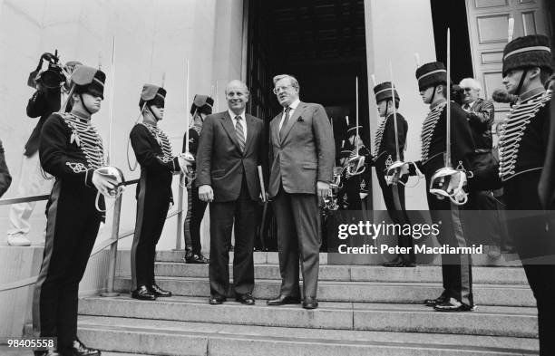 Secretary of Defense Dick Cheney visits the Ministry of Defence headquarters in Whitehall with UK Defence Secretary Tom King, 15th October 1990.