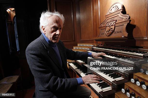 French composer, organist, pianist Jean Guillou plays the Saint-Eustache church's pipe organ, on March 24, 2010 in Paris. Since 1963 Guillou is the...