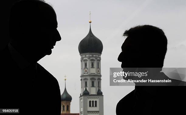 Manfred Amerell and his attorney Juergen Langer look on prior to the court hearing at the county court Augsburg on April 12, 2010 in Augsburg,...