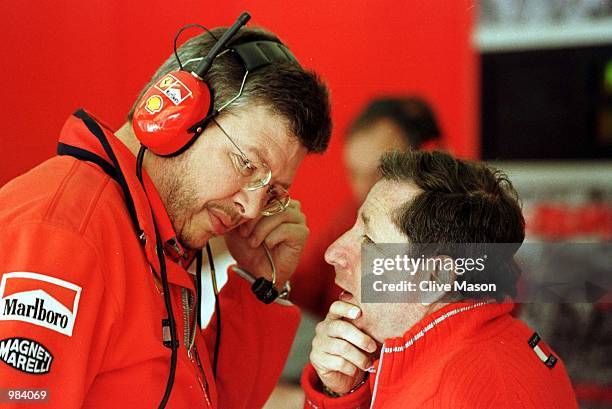 Ferrari team boss John Todt chats with Ross Brawn in the garage during the First free practice session for the Spanish Grand Prix at the Circuit de...