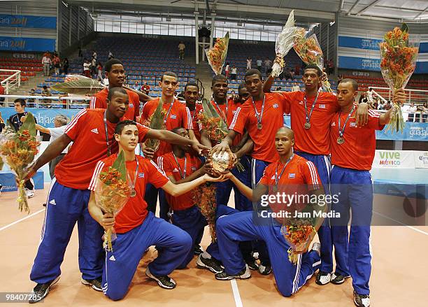 Cuba team players celebrate the first place at Boys' Youth Continental Championsh at the Sports Avila Camacho on April 11, 2010 in Zapopan, Mexico.