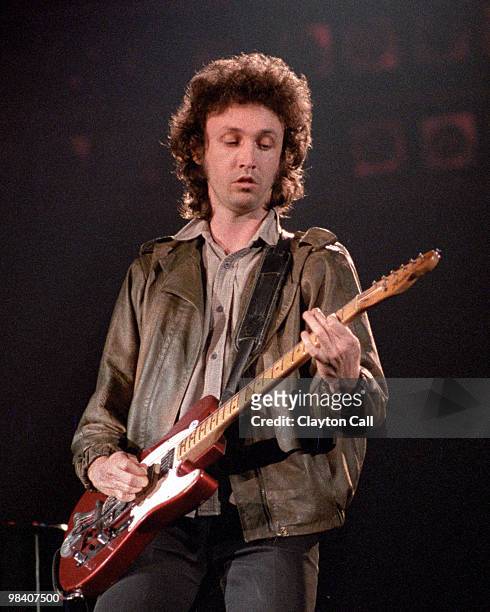 Mike Campbell performing live onstage with Tom Petty & The Heartbreakers at the Cow Palace in San Francisco on June 26, 1981. He plays a Fender...