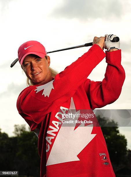 Suzann Pettersen of Norway poses with a Canadian hockey jersey as she prepares to defend her title at the CN Canadian Women's Open April 11, 2010 in...