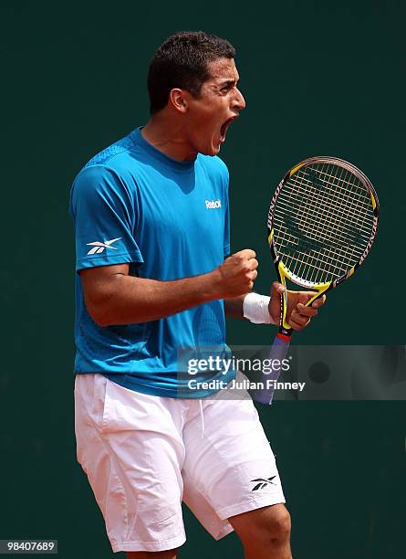 Nicolas Almagro of Spain celebrates in his match against Simon Greul of Germany during day one of the ATP Masters Series at the Monte Carlo Country...