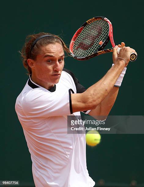 Oleksandr Dolgopolov Jr of Ukraine plays a backhand in his match against Julien Benneteau of France during day one of the ATP Masters Series at the...