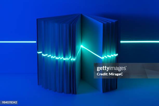 laser scanning opened book - book abstract stock-fotos und bilder