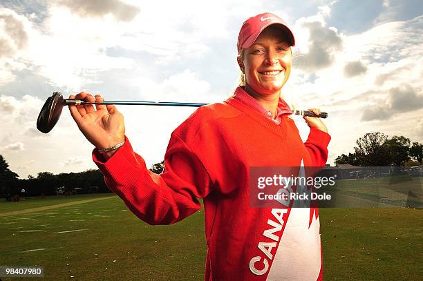 Suzann Pettersen of Norway poses with a Canadian hockey jersey as she prepares to defend her title at the CN Canadian Women's Open April 11, 2010 in...