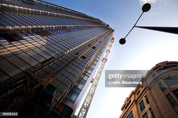 The Heron Tower, left, constructed by Heron International Ltd. Stands in London, U.K., on Monday, April 12, 2010. Heron International Ltd., the...