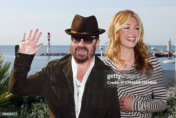 British TV host of the show "So You Think You Can Dance", Cat Deeley , and British musician Dave Stewart pose on April 12, 2010 in Cannes, southern...