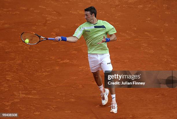 Juan Carlos Ferrero of Spain in action in his match against Marcel Granollers of Spain during day one of the ATP Masters Series at the Monte Carlo...