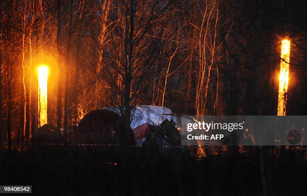 Russian rescuers work at the site of a Polish government Tupolev Tu-154 aircraft crash near Smolensk airport on April 10, 2010. A plane carrying...