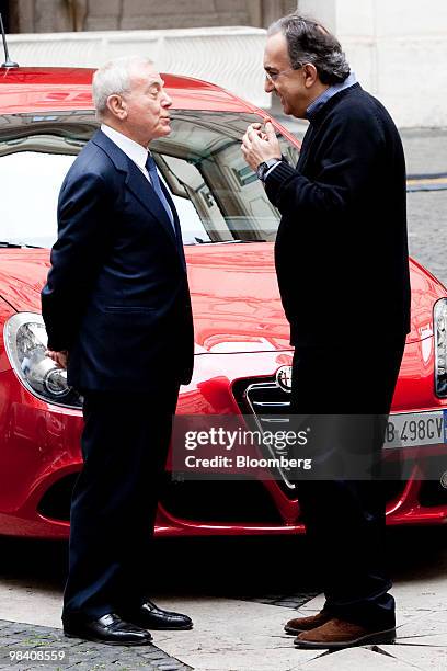 Sergio Marchionne, chief executive officer of Fiat SpA, right, speaks with Gianni Letta, under-secretary to the Italian prime minister's office, in...