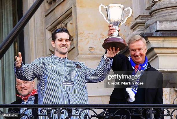 Guillaume Gille of Hamburg and Ole von Beust, mayor of Hamburg celebrate with the cup at the Hamburg townhall after winning the DHB German Cup final...
