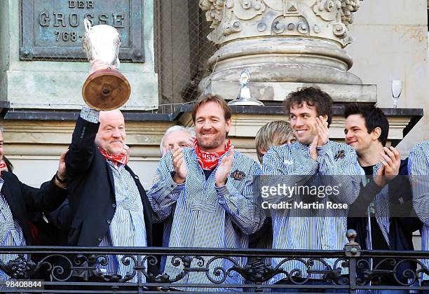 Andreas Rudolph, manager of Hamburg celebrates with the cup at the Hamburg townhall after winning the DHB German Cup final match between HSV Handball...