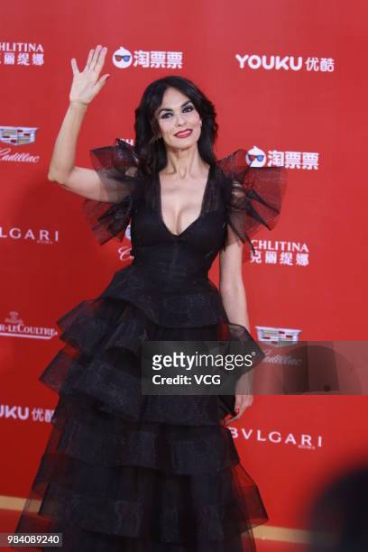 Italian actress Maria Grazia Cucinotta poses on the red carpet of the Golden Goblet Awards Ceremony during the 21st Shanghai International Film...