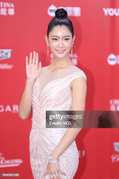 Model/actress Clara Lee poses on the red carpet of the Golden Goblet Awards Ceremony during the 21st Shanghai International Film Festival on June 24,...