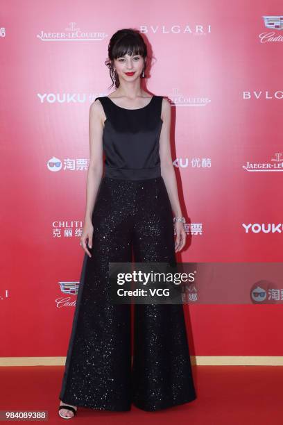 Japanese actress/model Ayami Nakajo poses on the red carpet of the Golden Goblet Awards Ceremony during the 21st Shanghai International Film Festival...