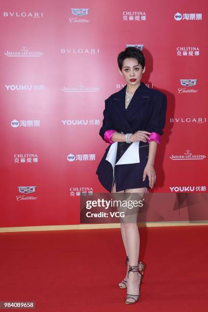 Actress Ning Jing poses on the red carpet of the Golden Goblet Awards Ceremony during the 21st Shanghai International Film Festival on June 24, 2018...