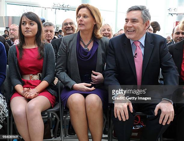 Labour Party supporter Ellie Gellard sits beside Prime Minister Gordon Brown and his wife Sarah during the launch of the Labour election manifesto at...