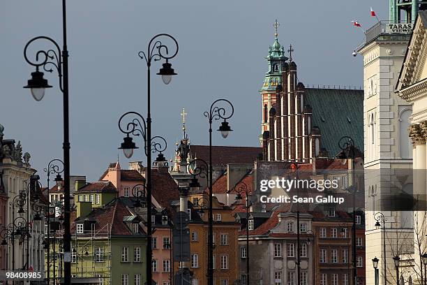 Ornate lampposts decorate the way towards buildings, including St. John's Cathedral, in the city's Old Town on April 12, 2010 in Warsaw, Poland....