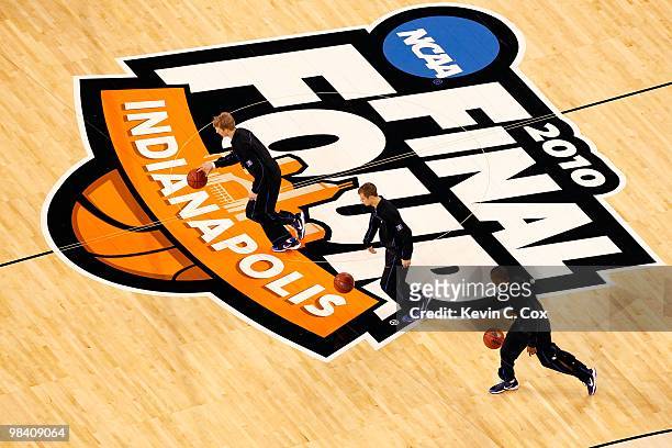 Kyle Singler, Jon Scheyer and Nolan Smith of the Duke Blue Devils warm up with teammates against the Butler Bulldogs during the 2010 NCAA Division I...