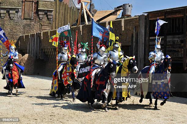 Actors perform during a rehearsal of a new show "Le Secret de la lance" at the Puy du Fou historical theme park in Les Epesses, western France, on...