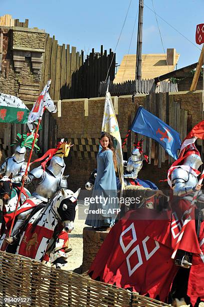 Actors perform during a rehearsal of a new show "Le Secret de la lance" at the Puy du Fou historical theme park in Les Epesses, western France, on...