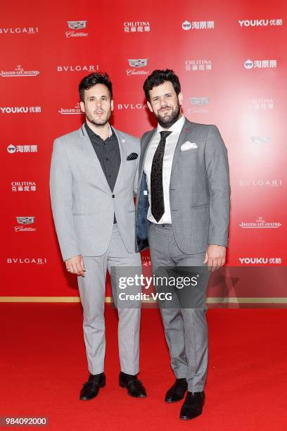 Directors Rodrigo Barriuso and Sebastian Barriuso pose on the red carpet of the Golden Goblet Awards Ceremony during the 21st Shanghai International...