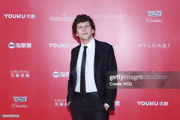 American actor Jesse Eisenberg poses on the red carpet of the Golden Goblet Awards Ceremony during the 21st Shanghai International Film Festival on...