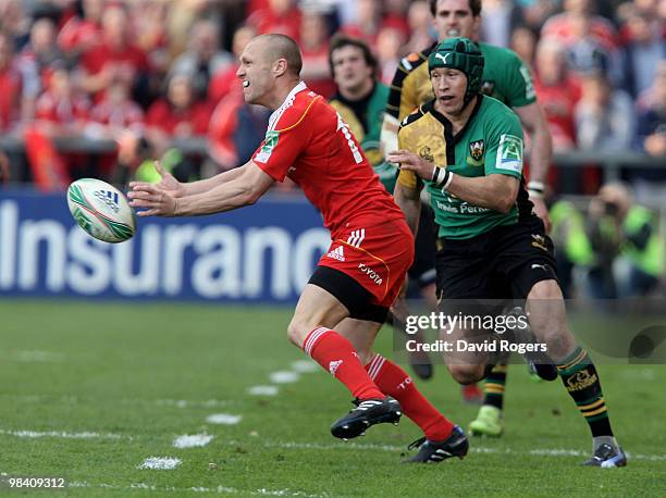 Paul Warwick of Munster passes the ball during the Heineken Cup quarter final match between Munster and Northampton Saints at Thomond Park on April...