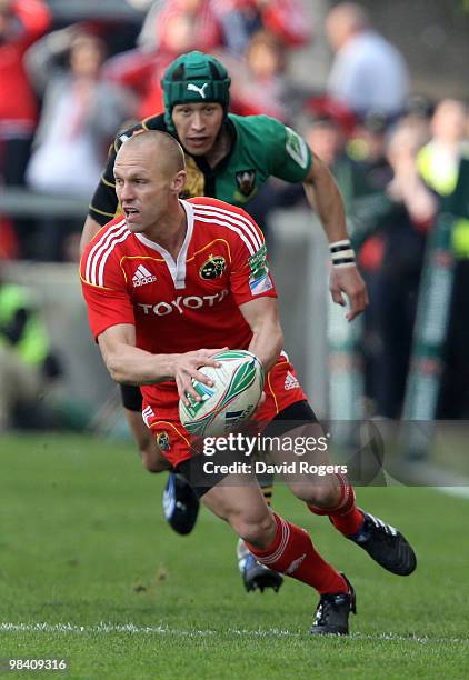 Paul Warwick of Munster passes the ball during the Heineken Cup quarter final match between Munster and Northampton Saints at Thomond Park on April...