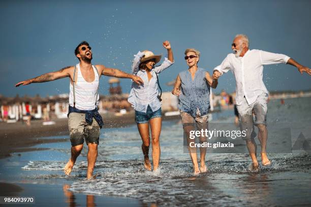 family on a vacation. - gilaxia stock pictures, royalty-free photos & images