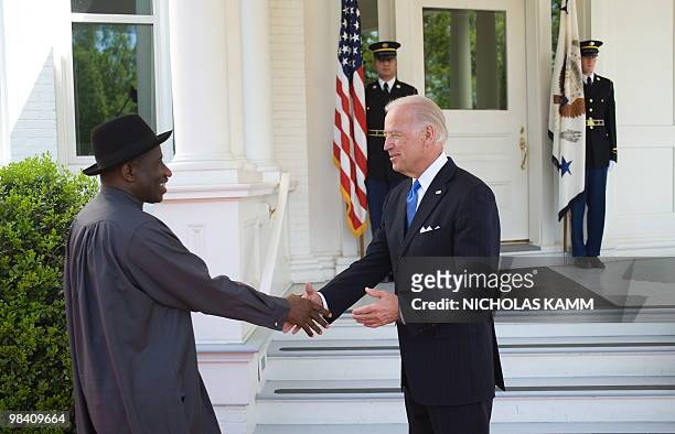 Vice President Joe Biden welcomes Nigerian acting President Goodluck Jonathan at the Naval Observatory, the vice president's residence, in...