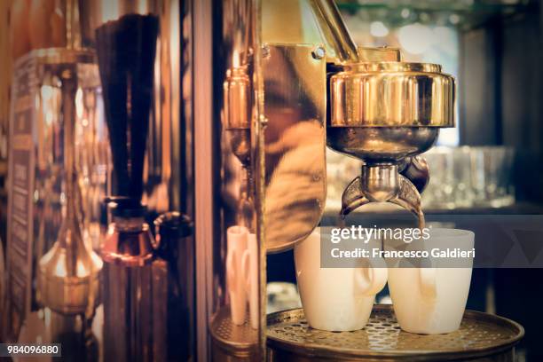 a coffee machine in trieste, italy. - triest stock-fotos und bilder