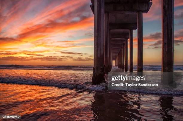 sunset at scripps pier - scripps pier stock pictures, royalty-free photos & images