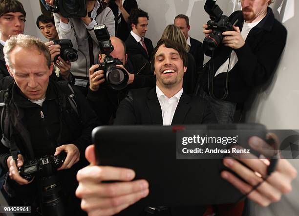 Man holds up a 'WePad' during the launch of the new 'WePad' - a mobile tablet browsing device on April 12, 2010 in Berlin, Germany. The soft-launch...